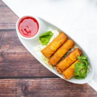 Vegetables Egg Rolls  · 4 crispy egg rolls filled with seasoned cabbage, carrots, and bean sprouts. Served with swee...