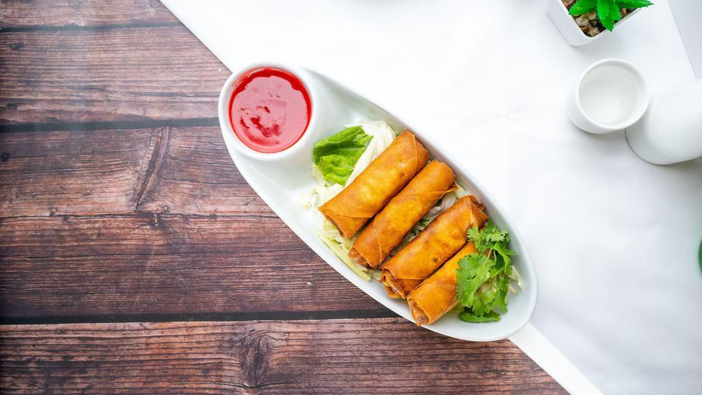 Vegetables Egg Rolls  · 4 crispy egg rolls filled with seasoned cabbage, carrots, and bean sprouts. Served with sweet and sour sauce.