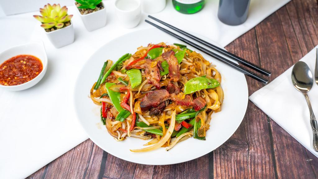 Chow Fun  · Flat rice noodles wok-fried with vegetables and your choice of protein