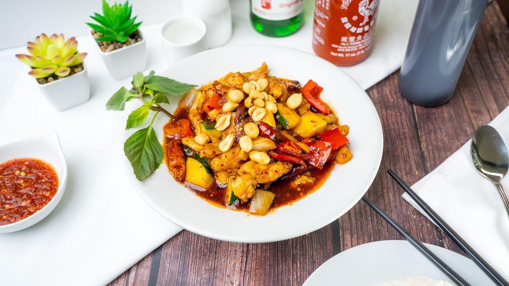 Kung Pao Beef · Stir-fried beef, zucchini, onions, bell peppers, chili peppers in spicy sauce, topped with peanuts.