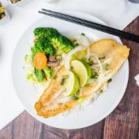 Lemon Grilled Fish  · Lightly pan-seared white fish in a lemon pepper seasoning, served with steamed veggies and r...