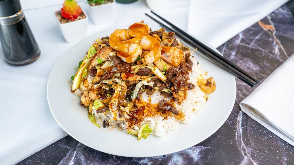 Teriyaki Combo  · Chicken, Beef, and Shrimp drizzled in teriyaki sauce served over steamed rice