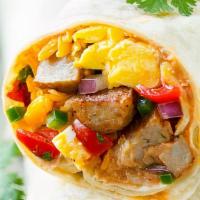 Breakfast Burrito  · Grilled potatoes, breakfast sausage, Scrambled cage-free eggs, tastey salsa and 4 wonderful ...