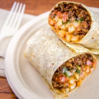 California Burrito · Carne asada, french fries, cheese, sour cream, guacamole,and tomatoes.