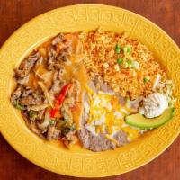 Chile Colorado · Served with rice and beans.