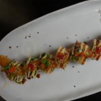 38 Special Roll · Shrimp tempura, avocado inside with seared crab salad, spicy tuna, seaweed salad, sweet ging...