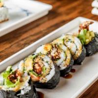 Spider Roll · Crispy soft shell crab, avocado, cucumber, and masago sauce.