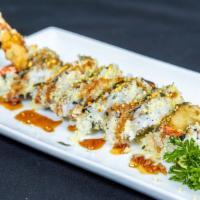 Crunchy Roll · Snow crab, shrimp tempura, avocado, topped with tempura flakes, sauce.
