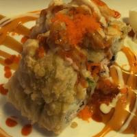 Paradise Roll · Scallop, snow crab, shrimp tempura, and avocado topped with hirame tempura roll, served with...