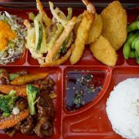 Bento Box · Your choice of two (2) items from the following entrées. Served with California roll, spring...