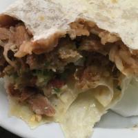 Super Burrito · Any meat, rice, beans, guacamole, sour cream, cilantro, and onion.