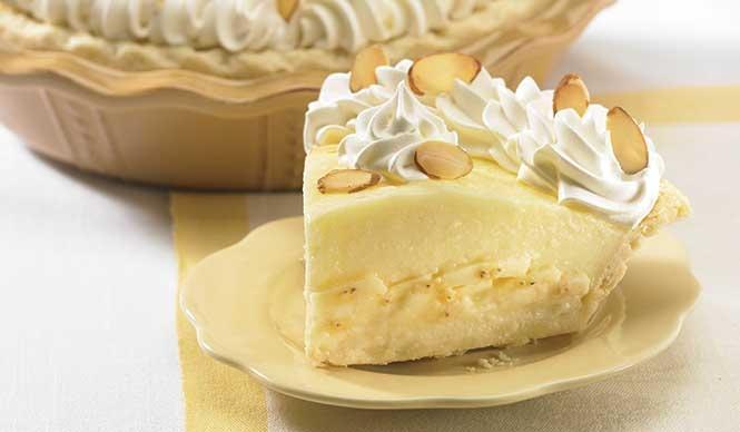 Banana Cream Slice · One of your favorites. Fresh ripe bananas, rich vanilla cream, fresh whipped cream or a fluffy meringue. Topped with sliced almonds.