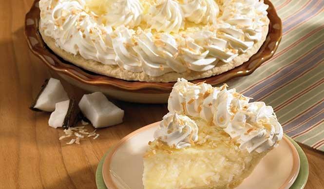 Coconut Cream Slice · Coconut folded into our rich vanilla cream. Topped with fresh whipped cream or fluffy meringue.