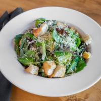 Kale Caesar · Mixed baby kale and romaine, parmesan, croutons, house-made caesar dressing.