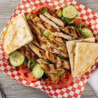 Grilled Cicken Salad · Salad served with grilled chicken breast, lettuce, egg, cheese, cucumbers, tomato, and your ...