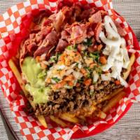 Dui Fries · Chili cheese fries with pastrami, carne asada, pico de gallo, sour cream, cheese and avocado...
