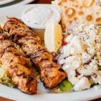 Chicken Souvlaki Plate · Fresh cut chicken, skewered and seasoned with Greek spices, cooked over open flame, served w...