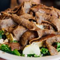 Gyro Salad · Chopped spring greens with your choice of any of our three gyro meats, beef and lamb, pork, ...