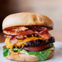 Bacon Cheese Burger · Grilled 1/3 pound all beef patty served with Cheddar cheese and bacon on a bun with lettuce,...