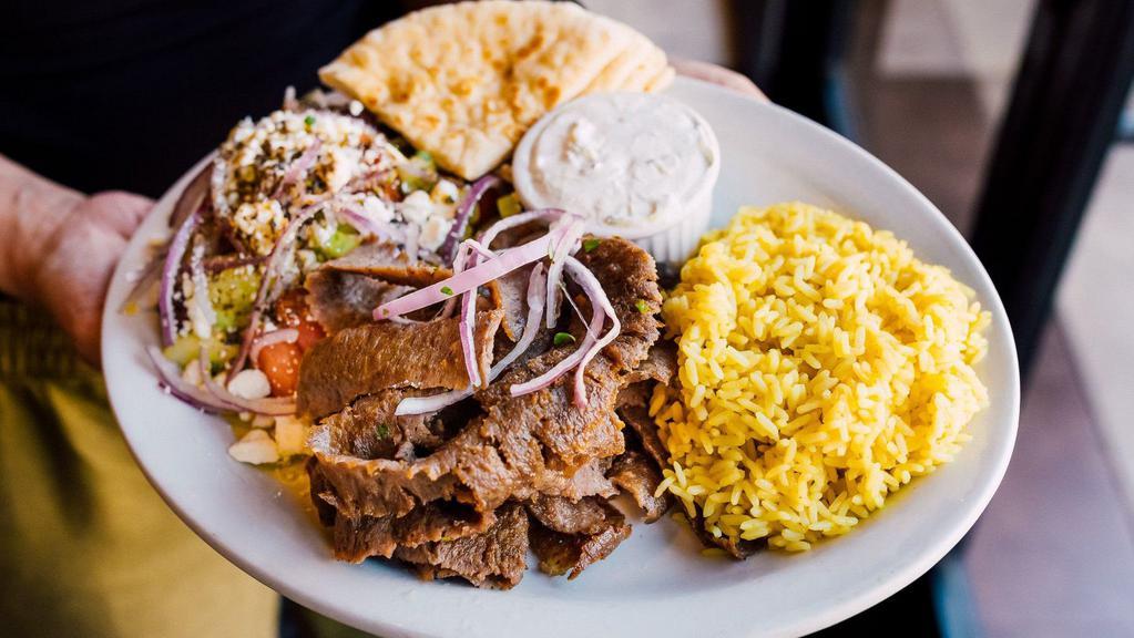 Gyro Plate · Your choice from any of our three incredibly tasty gyro meats beef and lamb, pork, or chicken, served with rice pilaf or french fries, Greek salad, tzatziki sauce or Greek yogurt and pita bread.