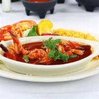 Camarones A La Diabla · Seven jumbo shrimp sauteed in fiery red sauce made with a combination of dried chiles, tomat...