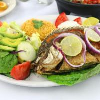 Mojarra Frita · A whole deep fried tilapia fish.