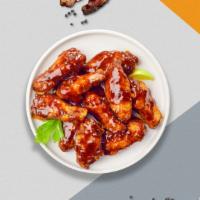 Bbq'S Cue Wings · Fresh chicken wings breaded, fried until golden brown, and tossed in barbecue sauce. Served ...