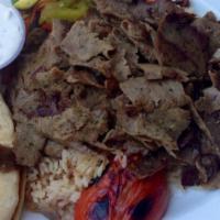 Gyro Plate · Seasoned beef and lamb thinly sliced, with grilled tomatoes.