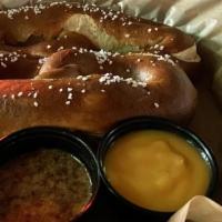 Soft Pretzel · Served with honey mustard or cheddar cheese sauce.