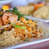 Pad Thai (22 Oz) · Pan‐fried rice noodles with scrambled eggs, bean sprouts, green onion and crushed peanuts. O...