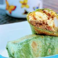 Breakfast Burrito · Potatoes, bell peppers, onions, scrambled eggs, cheese, salsa and your choice of meat and sh...