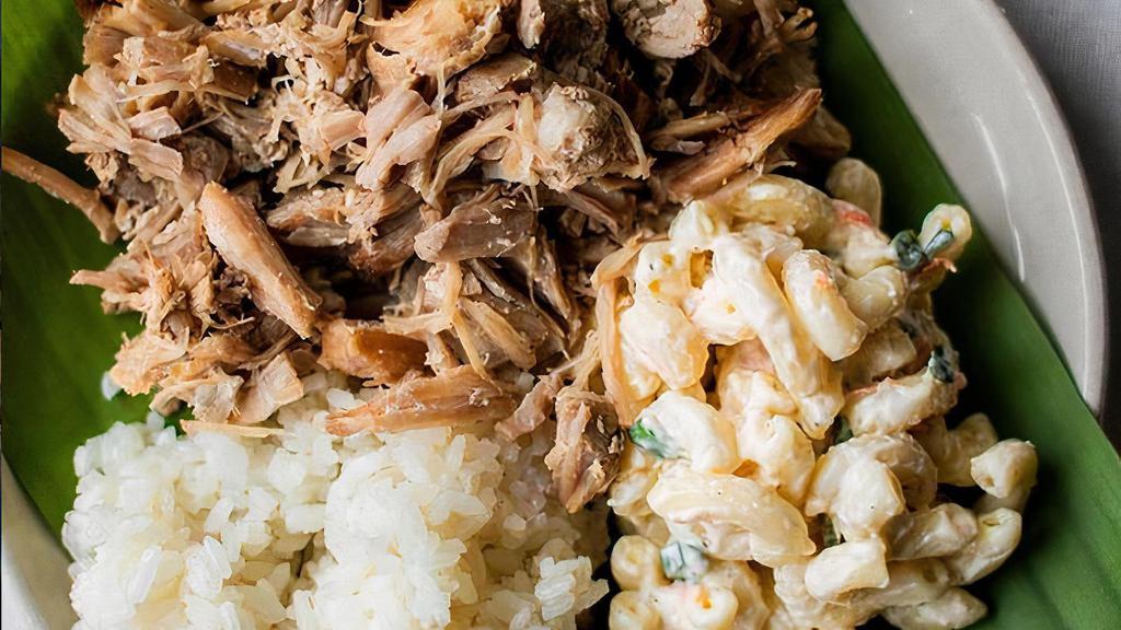 Kalua Pork Plate · Slow cooked kalua pork served with a side of rice and mac salad.