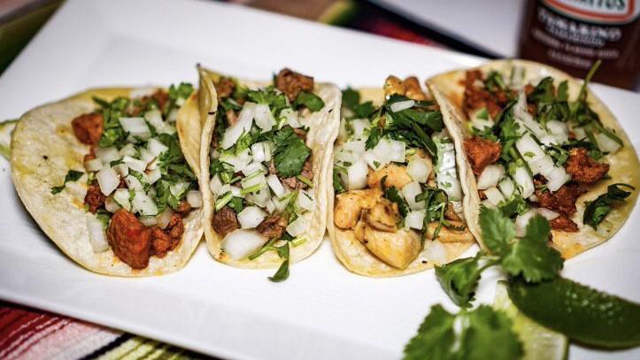 Street Tacos · Meat choice, topped with cilantro, onions, mild or hot salsa.