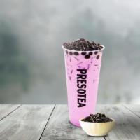Taro Milk Tea · A caffeine-free milk tea made with Taro. Black pearl not included.