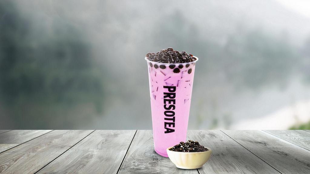 Taro Milk Tea · A caffeine-free milk tea made with Taro. Black pearl not included.