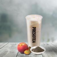 White Peach Oolong Milk Tea · Light oolong tea infused with white peach and creamer