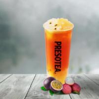 Lychee Fruit Tea · Lychee Black Tea with calamansi, lychee puree, topping of lychee coconut jelly, and orange s...