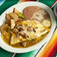 Chile Verde Omelette  · Chile verde and cheese inside the omelette topped with chile verde sauce and cheese served w...