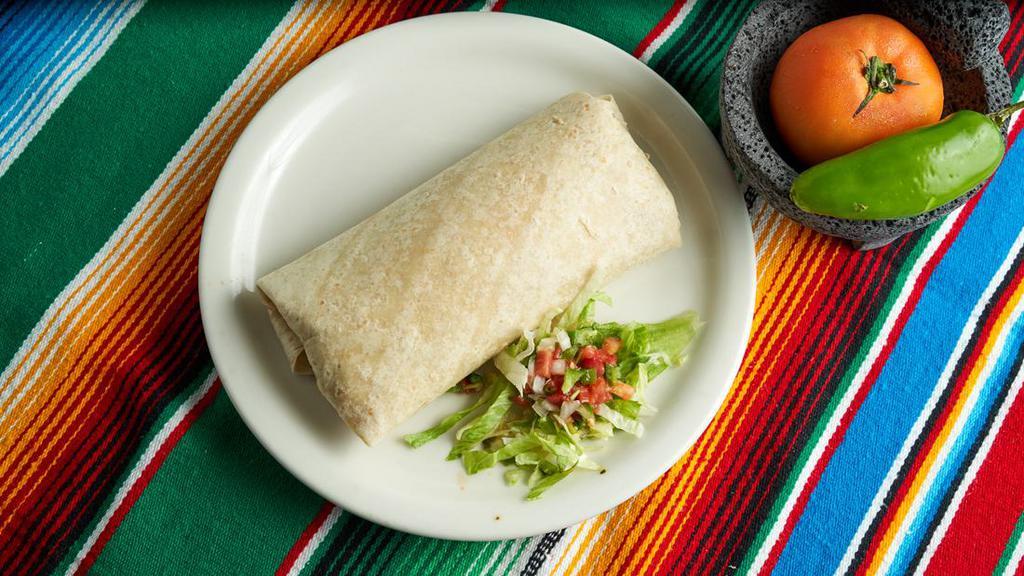 Los Rancheros Burrito · Your choice of meat, cheese, rice, beans, lettuce, sour cream, guacamole and pico de gallo.