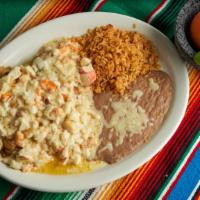 Seafood Chile Rellenos · Two Chile Rellenos topped with crab, fish, shrimp and seafood sauce