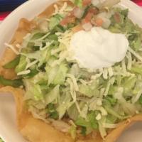 Tostada Supreme  · Flour bowl tortilla with your choice of meat, bell pepper, onion, lettuce, beans, rice, chee...