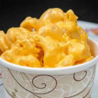Cheddar Mac & Cheese · Our creamy cheddar mac and cheese is made in house daily with real cheese and our own signat...