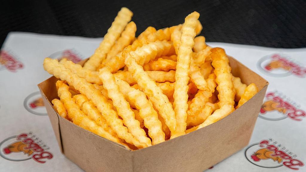 Crinkle Cut Fries · Crispy crinkle cut fries tossed in seasoning salt.