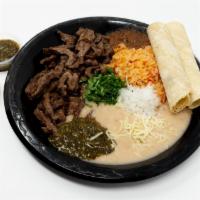 Carne Asada Plate · Comes with rice and beans, flour, or corn tortillas.