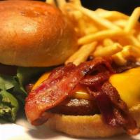Bacon Cheddar Burger · Ground chuck patty with bacon and cheddar cheese. It comes with lettuce, tomato, and pickles...