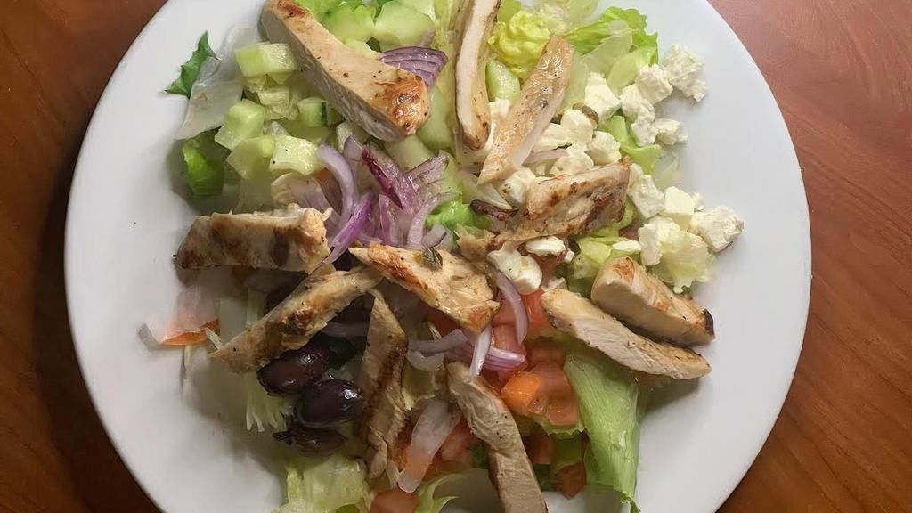 Chicken Greek Salad  · Chicken breast, feta cheese, Kalamata olives, cucumber, onion, tomato, and Greek dressing. Over fresh cut lettuce.