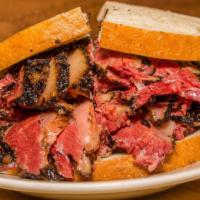 Spicy Pastrami Sandwich · Delicious pastrami sandwich with pickles, mustard, onions and hot sauce.