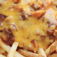 Chili Cheese Fries · Homemade crispy fries with melted cheese and chili.