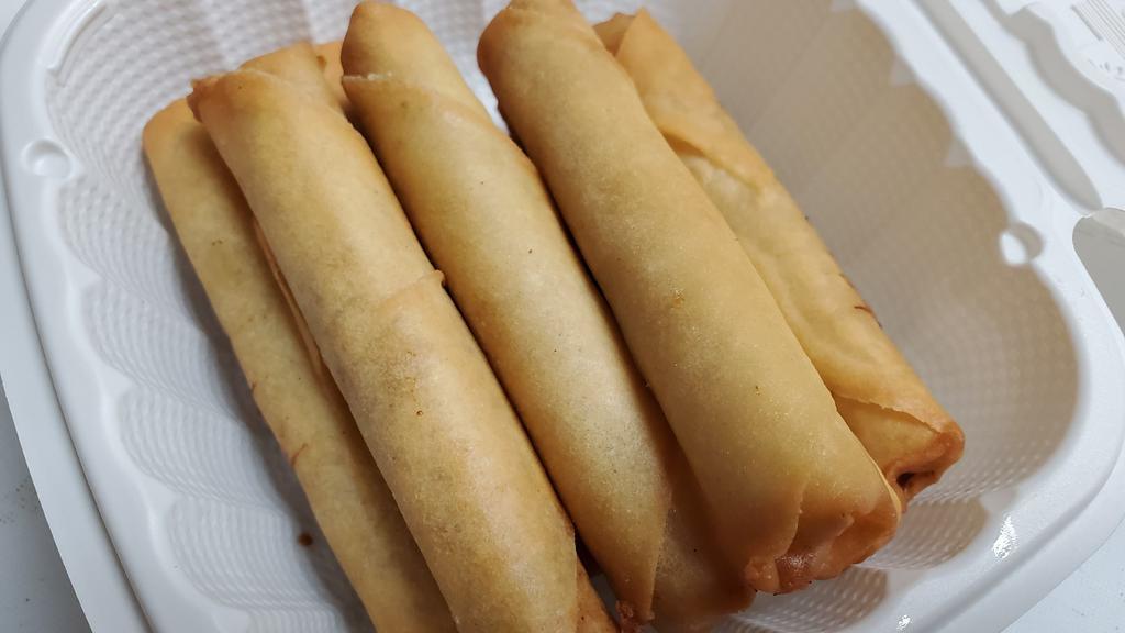 Pork Lumpia (5) · Pork wrap with a egg roll  wrapping .