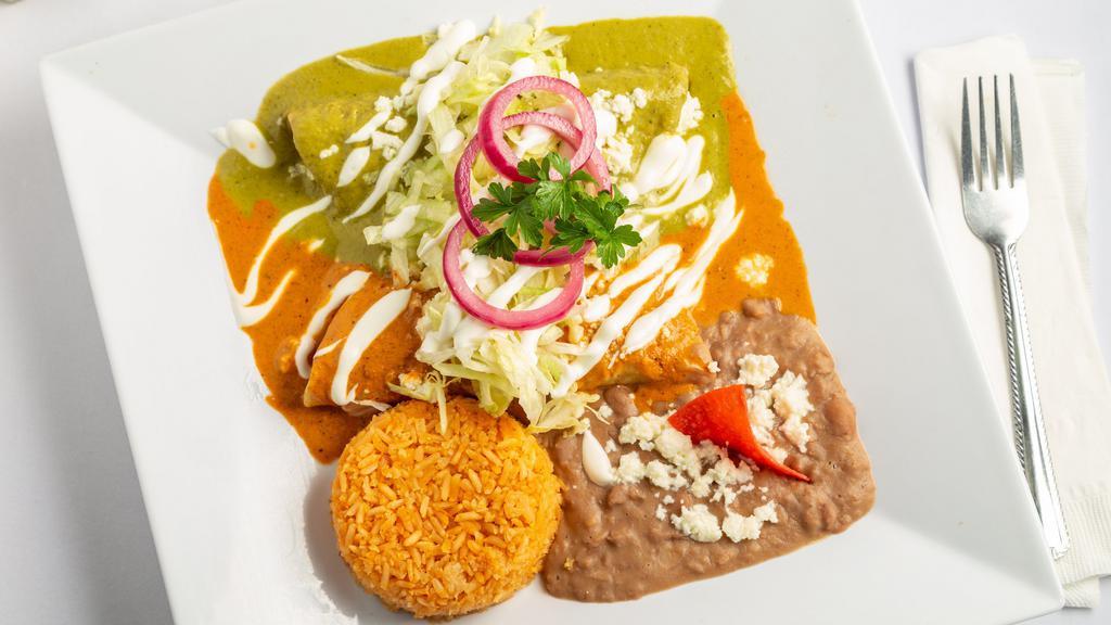 Enchiladas (3 Pc) · Stuffed with chicken or cheese, choice of a delicious homemade sauce, sour cream and cheese, served with beans and potatoes.
